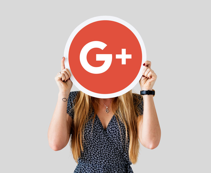 woman-holding-google-plus-icon